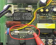 Click for bigger picture of the Telephone Line Fast Blow Fuse in the Controller (circled in red)