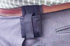#19 Cell Phone Pouch, on Belt... This pouch has a Motorola Bluetooth Headset in it.